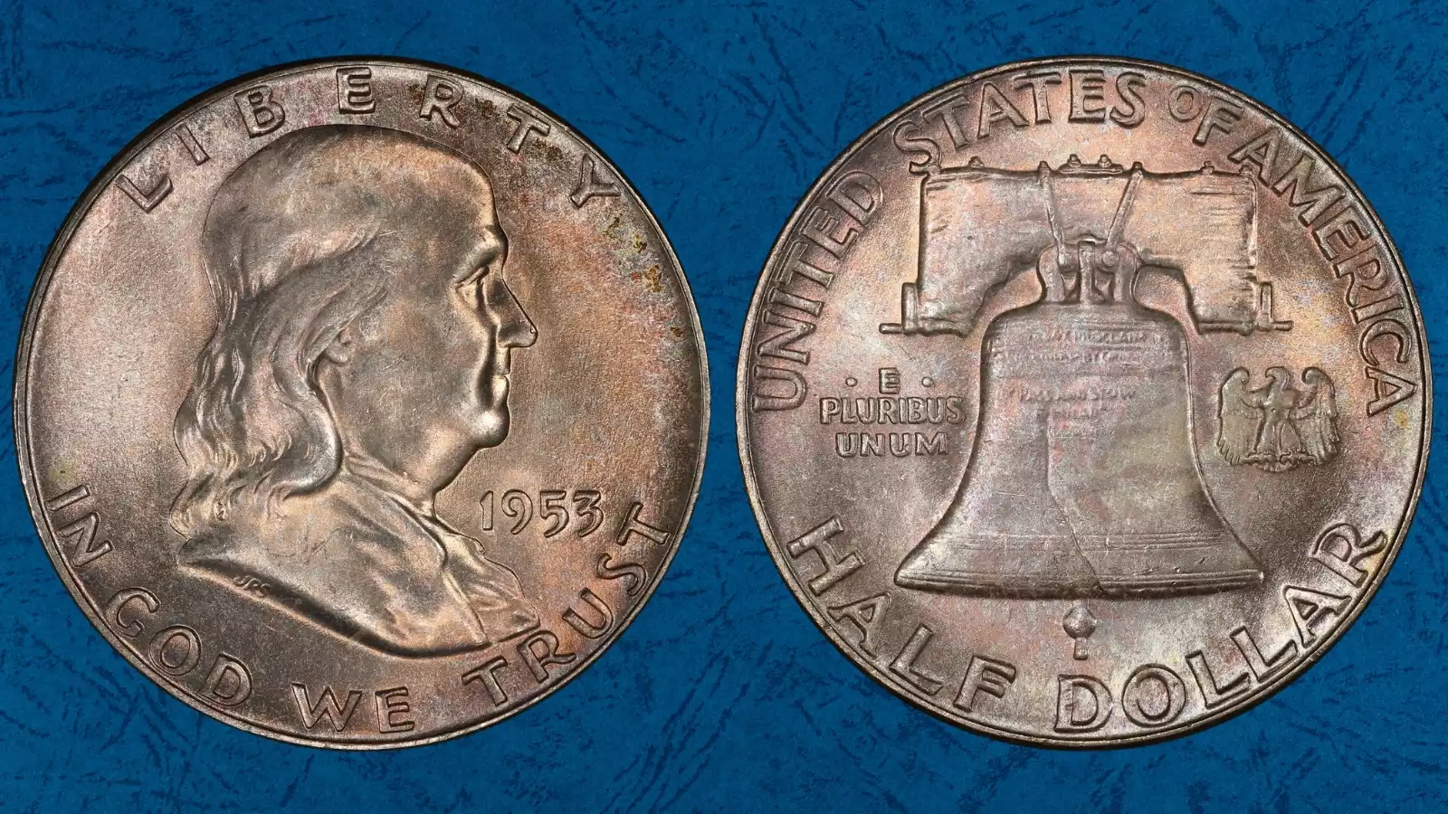 1953 Franklin half dollar lamination error showing peeled or split metal layer on the coin's surface due to planchet impurities